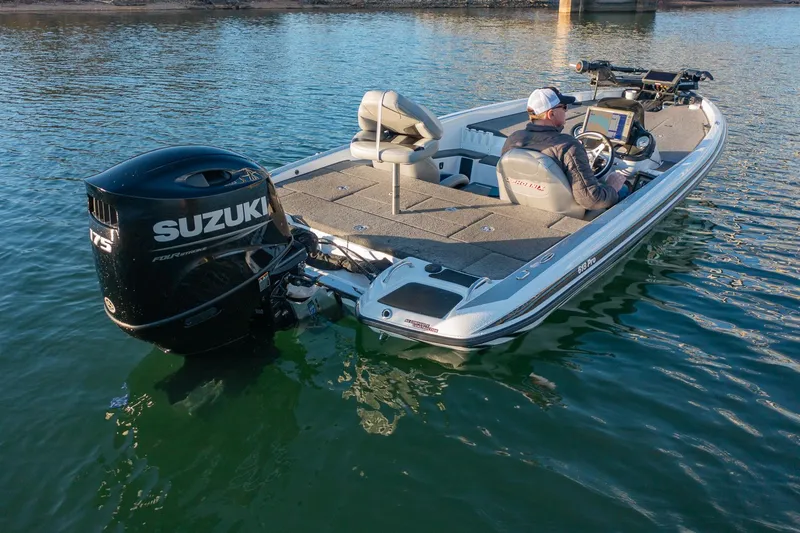 Slide: The Image of 2017 Phoenix 618 Pro boat with Suzuki engine on calm water. - 6