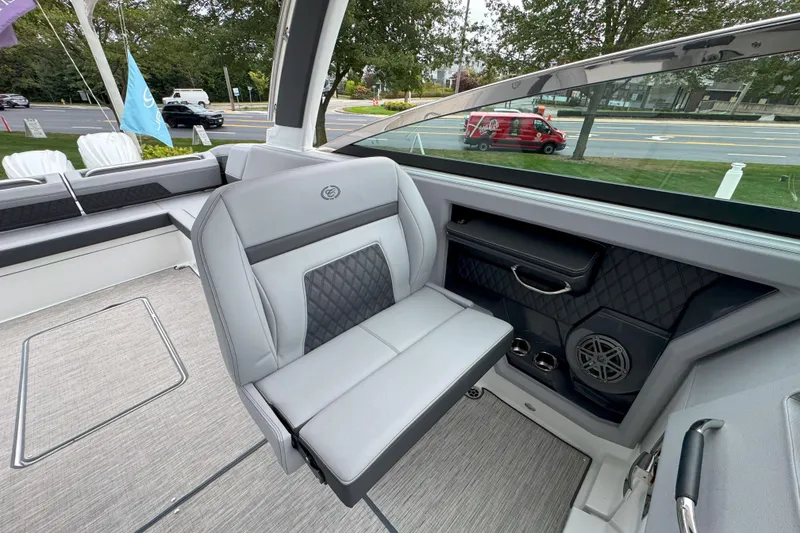 Slide: The Image of Interior of 2025 Cobalt R33 OB boat with luxurious seating and modern design. - 17