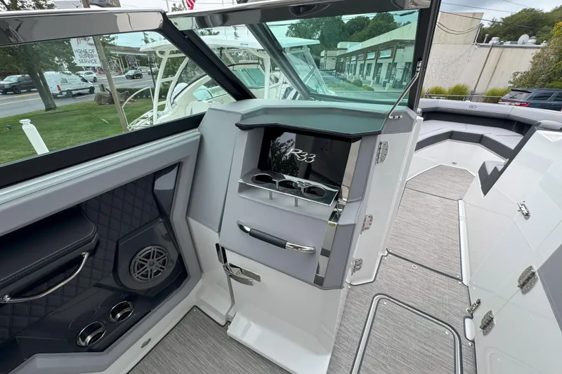 Slide: The Image of 2025 Cobalt R33 OB boat interior with sleek design and modern amenities. - 18