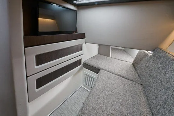 Slide: The Image of Interior of 2025 Cobalt R33 OB boat with modern seating and storage. - 20