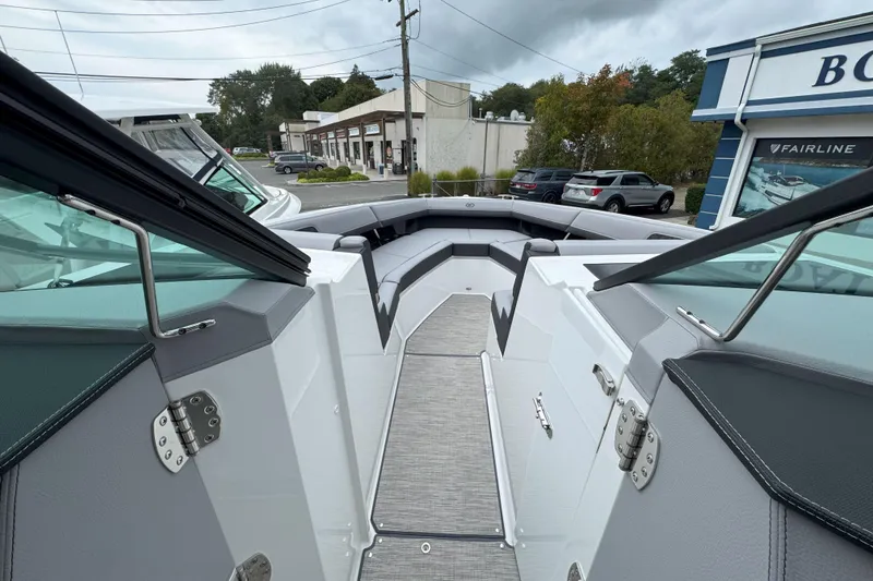 Slide: The Image of 2025 Cobalt R33 OB boat interior with sleek seating and modern design. - 21