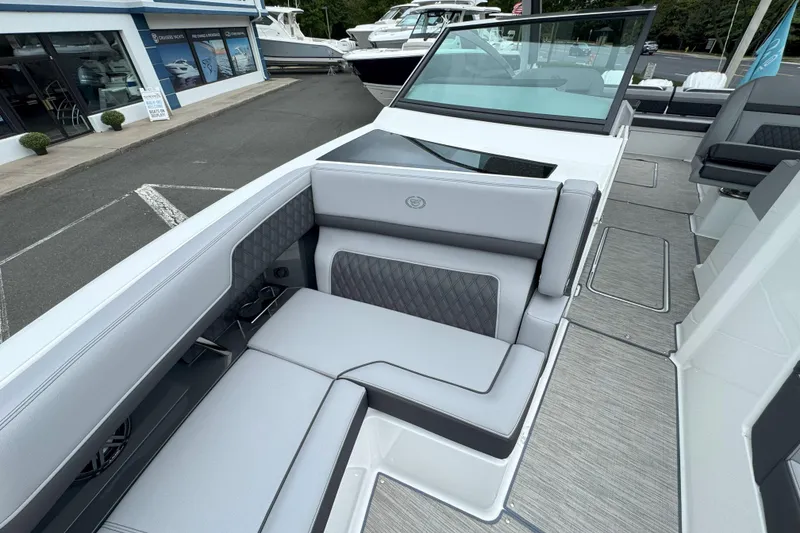 Slide: The Image of 2025 Cobalt R33 OB boat interior with luxurious seating and modern design. - 24