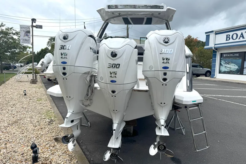 Slide: The Image of 2025 Cobalt R33 OB boat with triple Yamaha 300 V6 4.2L outboard engines. - 4