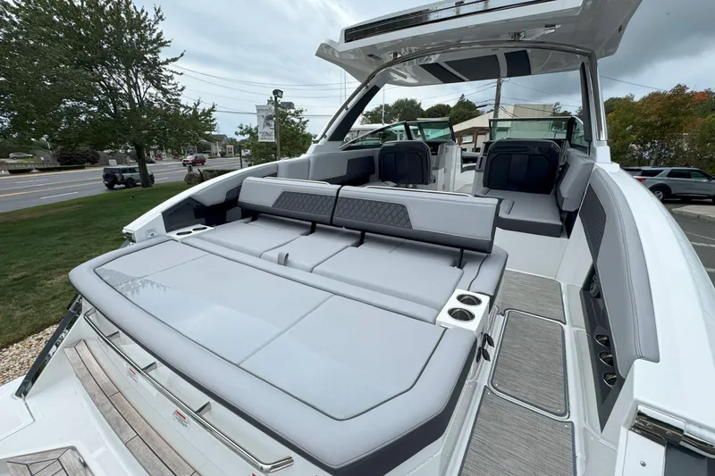 Slide: The Image of 2025 Cobalt R33 OB luxury boat with spacious seating and sleek design. - 6