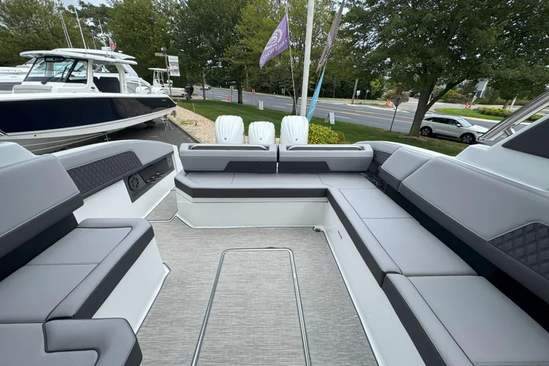 Slide: The Image of 2025 Cobalt R33 OB boat interior with sleek seating and modern design. - 9
