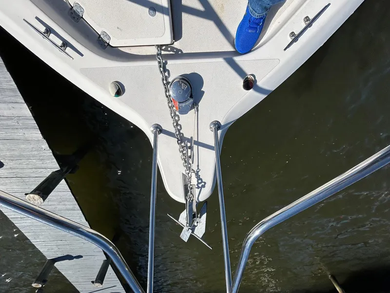 Slide: The Image of Bow view of 1997 Pro-Line 2810 Walkaround boat with anchor and chain. - 30