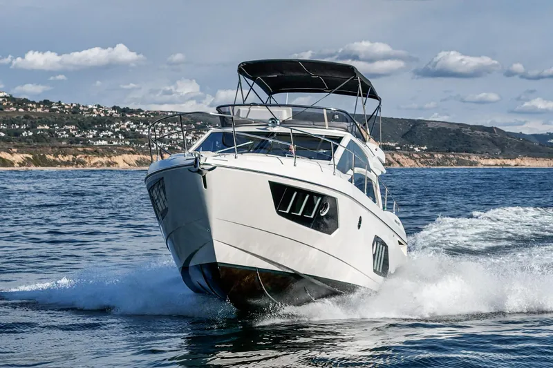 Slide: The Image of Luxury Absolute 45 FLY yacht cruising on open water, 2019 model. - 11