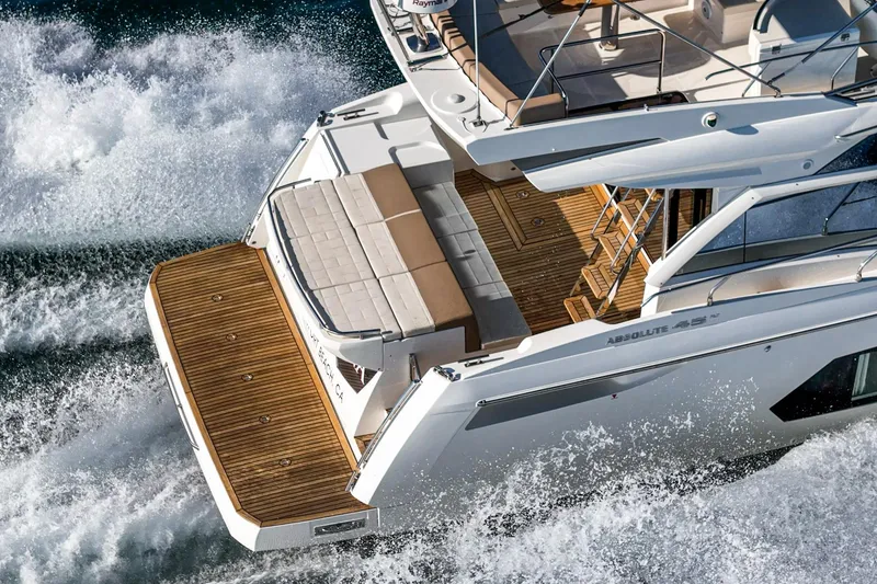 Slide: The Image of Luxury Absolute 45 FLY yacht cruising, 2019 model, featuring elegant deck design and powerful performance. - 21