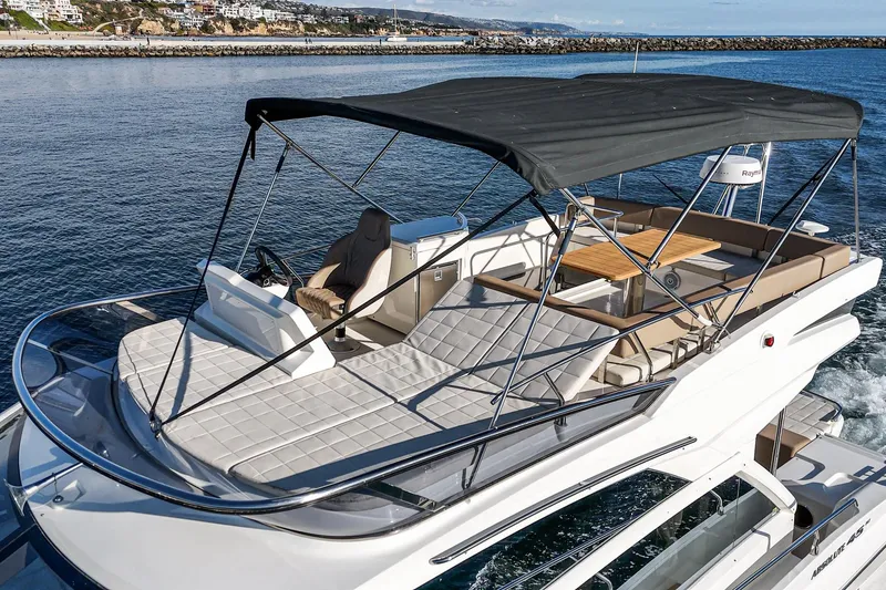 Slide: The Image of Luxury Absolute 45 FLY yacht, 2019 model, cruising on serene waters. - 26