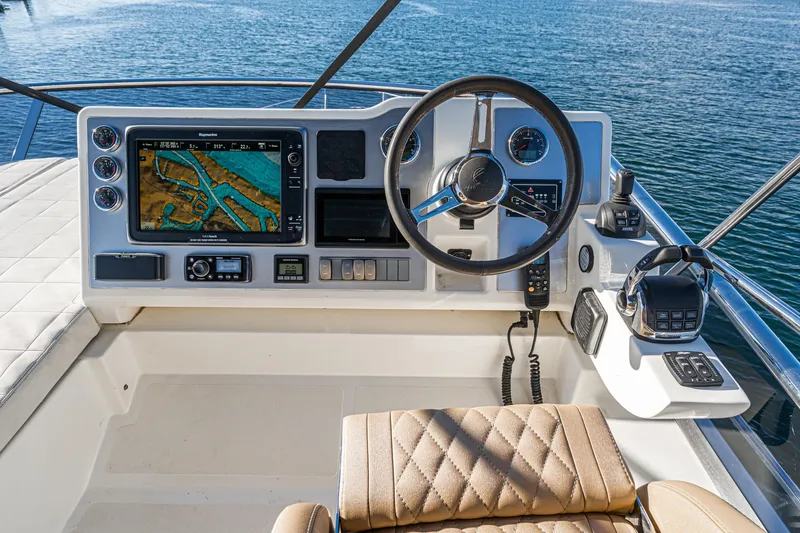 Slide: The Image of Cockpit of 2019 Absolute 45 FLY yacht with navigation system and steering wheel. - 29