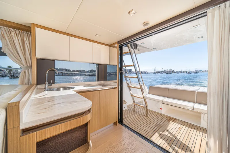 Slide: The Image of Interior view of 2019 Absolute 45 FLY yacht with ocean backdrop. - 37