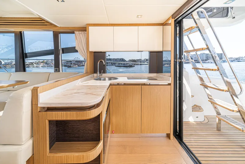 Slide: The Image of Luxurious interior of 2019 Absolute 45 FLY yacht with modern kitchen and scenic views. - 38