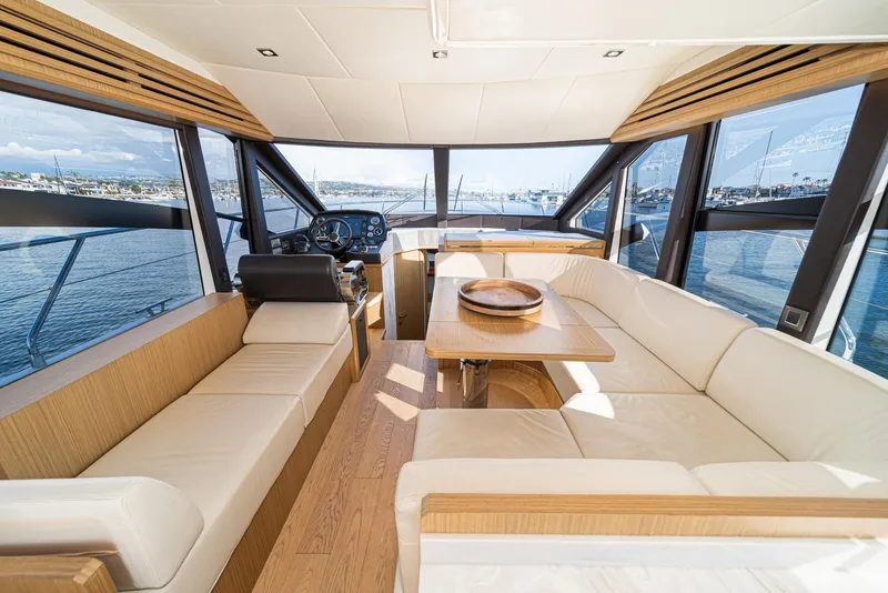Slide: The Image of Luxurious interior of 2019 Absolute 45 FLY yacht with panoramic windows and elegant seating. - 40