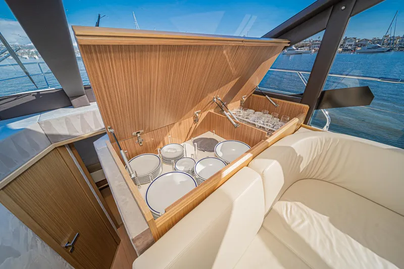 Slide: The Image of Luxurious interior of 2019 Absolute 45 FLY yacht with elegant dining setup. - 47