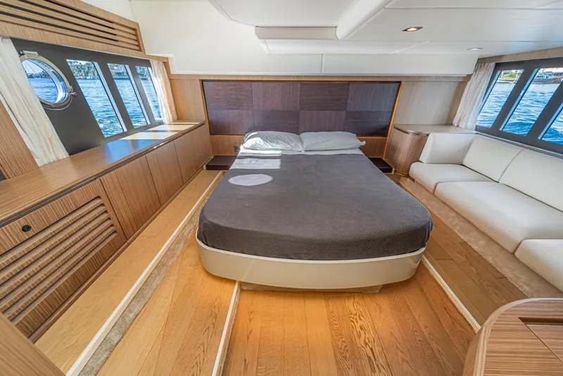 Slide: The Image of Luxurious bedroom interior of 2019 Absolute 45 FLY yacht with modern design and scenic windows. - 49