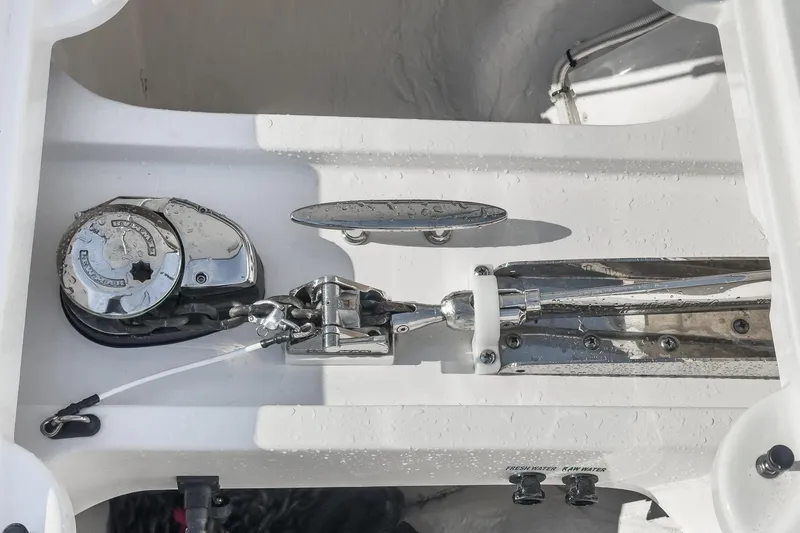 Slide: The Image of Anchor system of 2021 Tiara Yachts 53 Coupe, featuring polished metal components. - 24