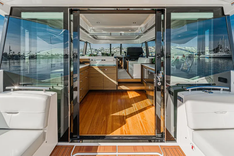 Slide: The Image of 2021 Tiara Yachts 53 Coupe interior with sleek design and panoramic windows. - 37