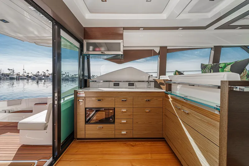 Slide: The Image of Luxurious interior of 2021 Tiara Yachts 53 Coupe with modern kitchen and scenic views. - 41