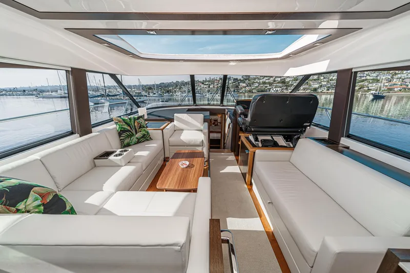 Slide: The Image of Luxurious interior of 2021 Tiara Yachts 53 Coupe with panoramic windows and elegant seating. - 46