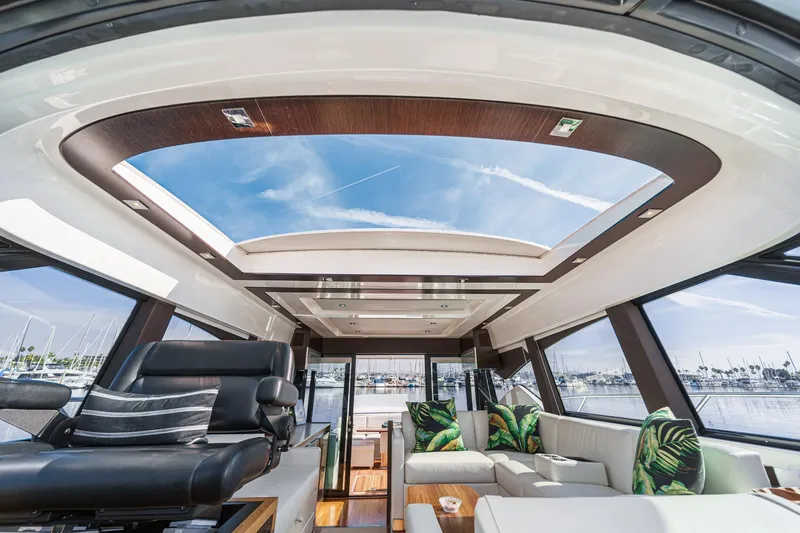 Slide: The Image of Luxurious interior of 2021 Tiara Yachts 53 Coupe with panoramic sunroof and elegant seating. - 47