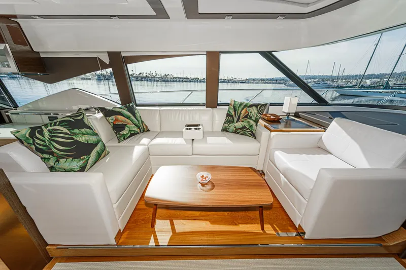Slide: The Image of Luxurious interior of 2021 Tiara Yachts 53 Coupe with elegant seating and scenic views. - 49