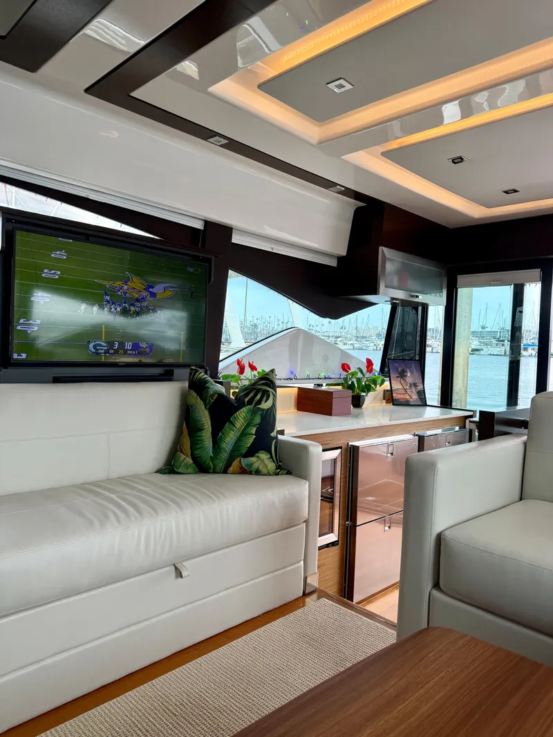 Slide: The Image of Luxurious interior of 2021 Tiara Yachts 53 Coupe with modern seating and entertainment system. - 9