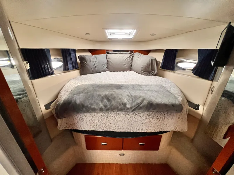 Slide: The Image of Luxurious 2008 Formula 37 PC yacht cabin with cozy bed and elegant decor. - 13