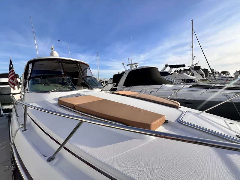 Slide: The Image of 2008 Formula 37 PC yacht docked with clear blue sky background. - 17