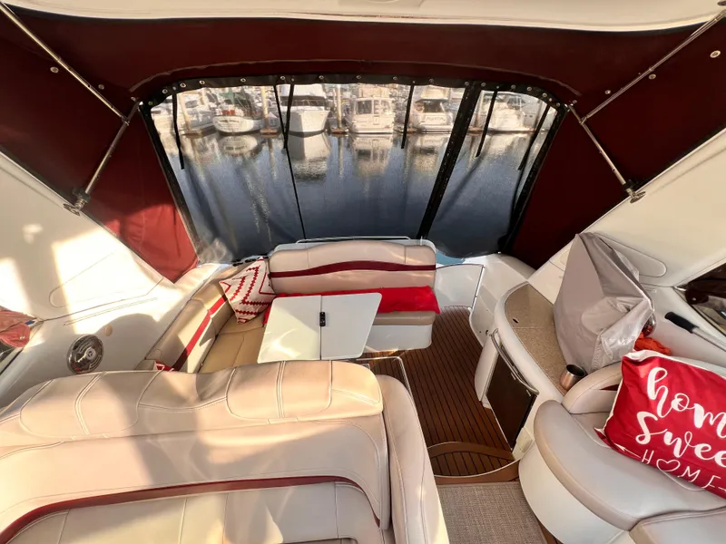 Slide: The Image of Interior of 2008 Formula 37 PC yacht with plush seating and marina view. - 4