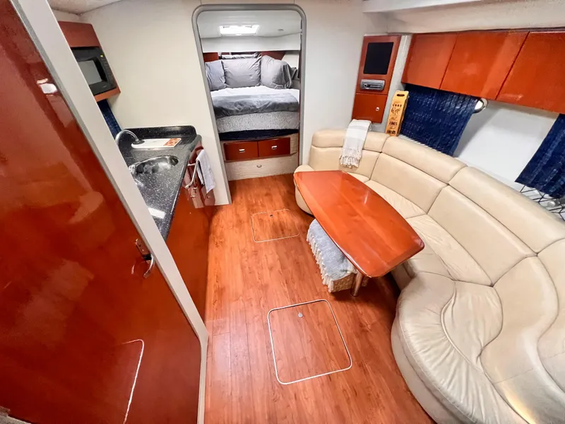Slide: The Image of 2008 Formula 37 PC yacht interior with kitchen, seating area, and bedroom. - 9
