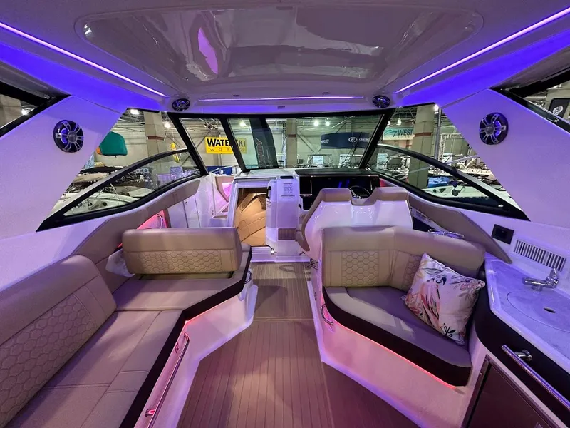 Slide: The Image of Luxurious interior of 2025 Sea Ray Sundancer 320 yacht with ambient lighting. - 10