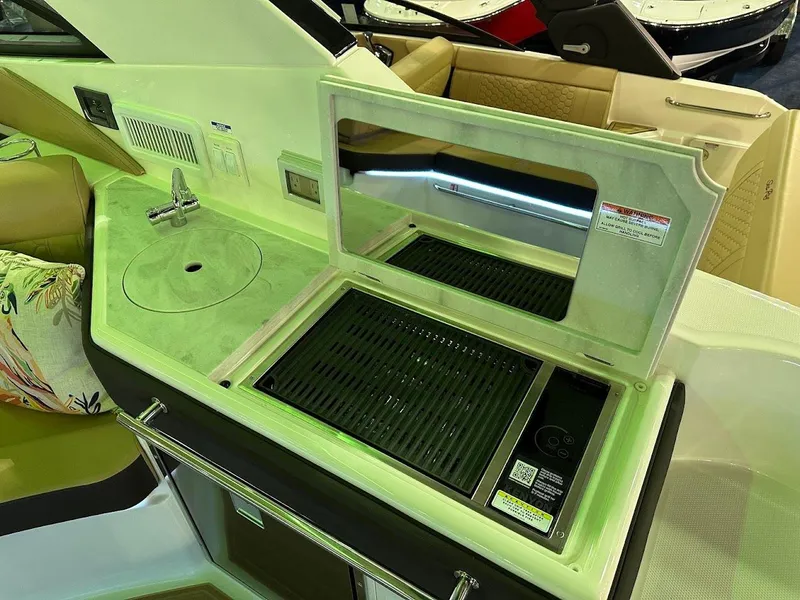 Slide: The Image of Outdoor kitchenette on 2025 Sea Ray Sundancer 320 yacht with sink and grill. - 33
