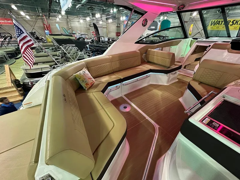 Slide: The Image of Luxurious interior of 2025 Sea Ray Sundancer 320 yacht with plush seating. - 8