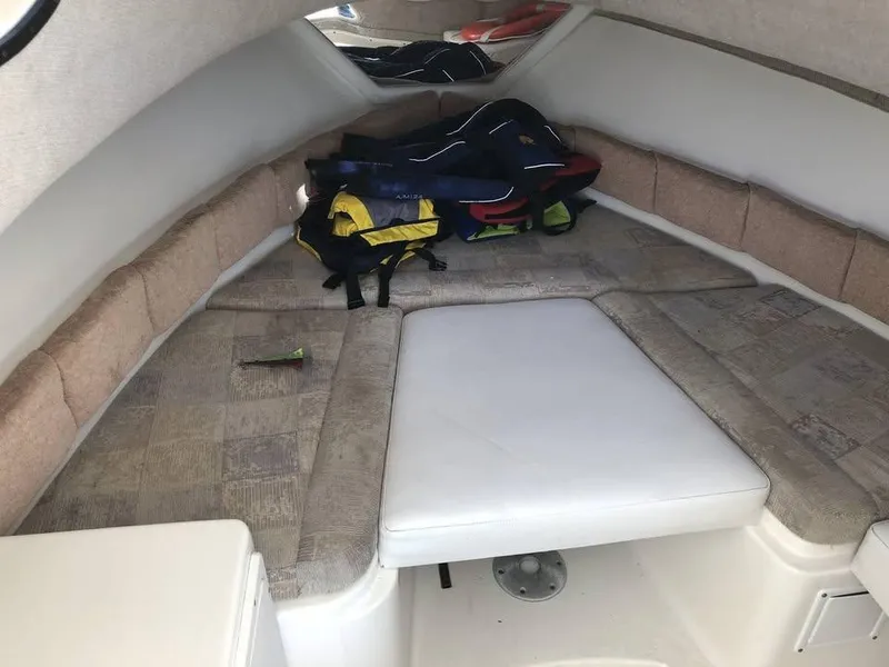 Slide: The Image of Interior cabin of 2008 Seaswirl 2601 Walkaround I/O with seating and gear. - 14