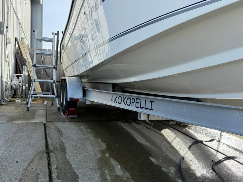 Slide: The Image of 2008 Seaswirl 2601 Walkaround I/O boat on trailer labeled "Kokopelli" in storage area. - 20