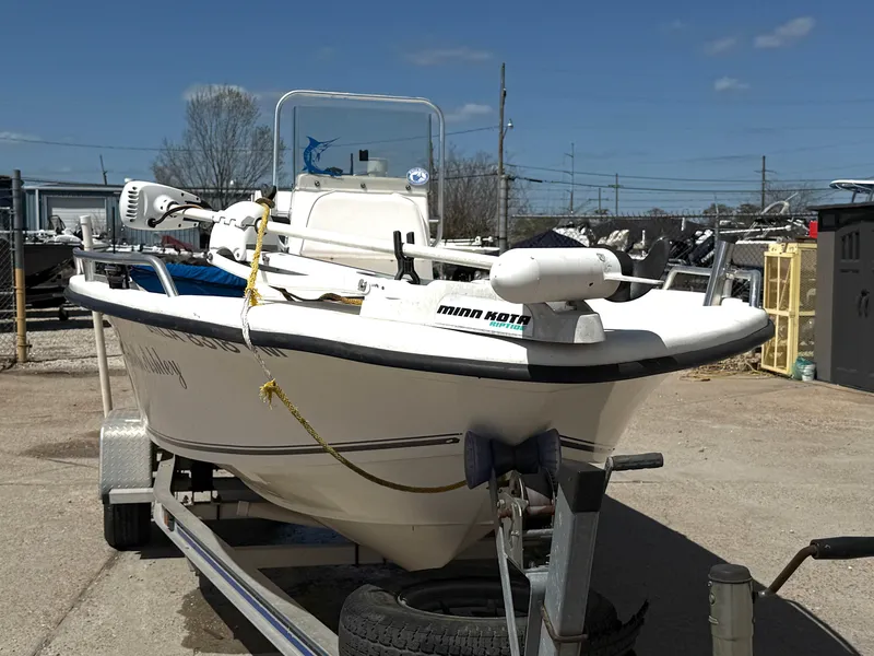 Slide: The Image of 2005 Sea Chaser 1950 RG boat on trailer, equipped with Minn Kota motor. - 8