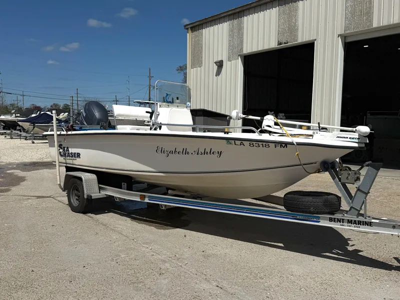 Slide: The Image of 2005 Sea Chaser 1950 RG boat on trailer outside a warehouse. - 9