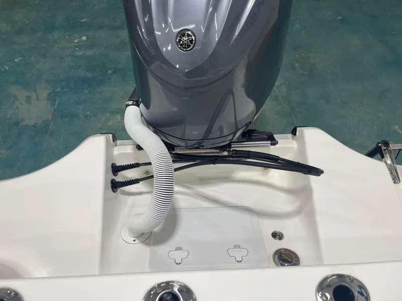 Slide: The Image of 2023 Tidewater 232cc boat engine and deck details, featuring sleek design and modern fittings. - 29