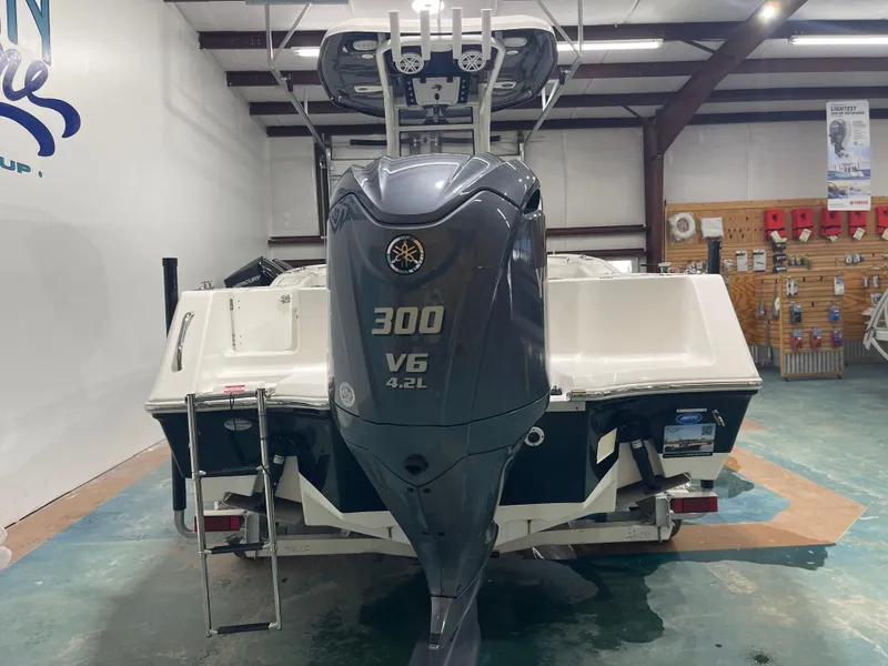 Slide: The Image of 2023 Tidewater 232cc boat with Yamaha 300 V6 engine in showroom. - 37