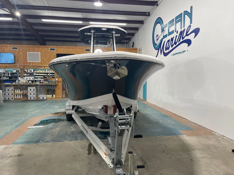 Slide: The Image of 2023 Tidewater 232cc boat on trailer in Ocean Marine showroom. - 8