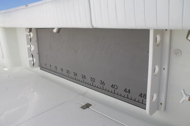 Slide: The Image of 2014 Yellowfin 32 Offshore boat with built-in measuring board. - 30