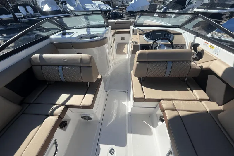 Slide: The Image of Interior of 2017 Sea Ray 270SDX boat with beige seating and modern dashboard. - 17