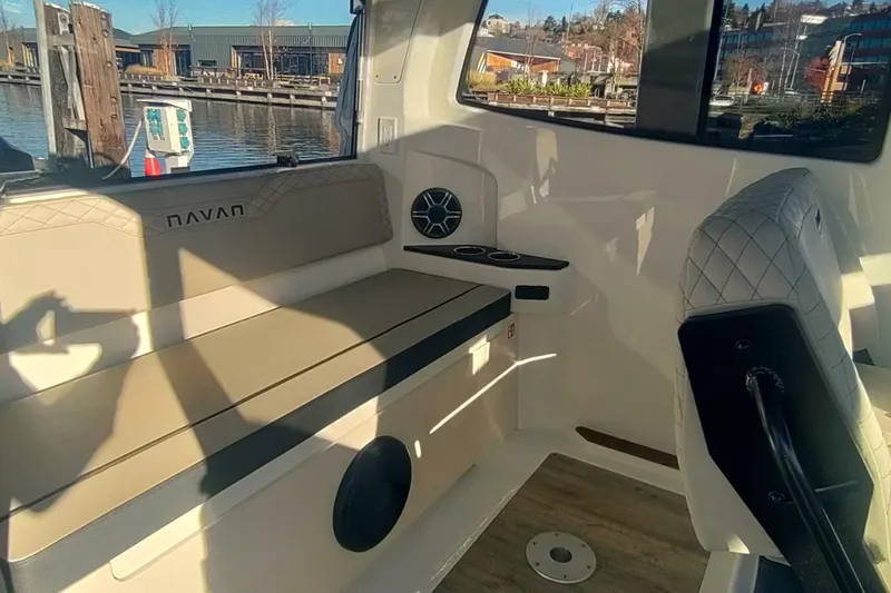 Slide: The Image of Interior of 2026 Navan C30 boat cabin with modern design and ambient lighting. - 7