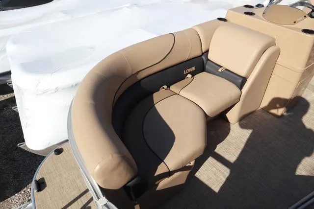 Slide: The Image of 2020 Lowe SS 210 V boat with beige seating and modern design. - 11
