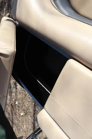 Slide: The Image of Close-up of beige seating on a 2020 Lowe SS 210 V boat. - 15