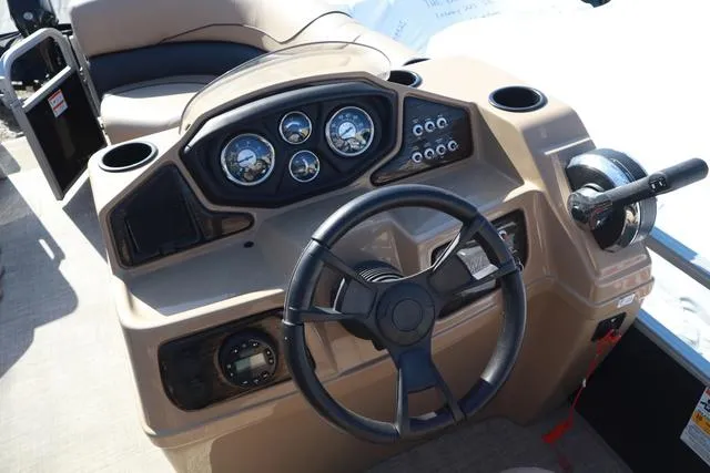 Slide: The Image of Steering console of 2020 Lowe SS 210 V boat with gauges and controls. - 9