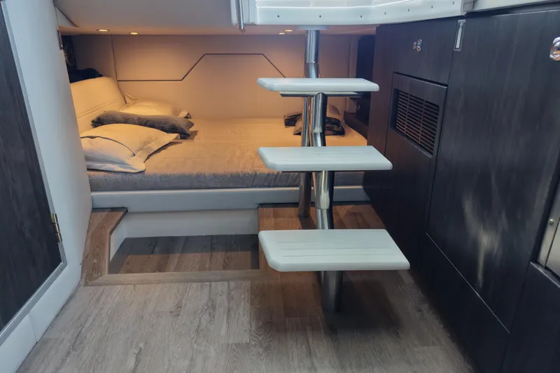 Slide: The Image of 2024 Formula 430 SSC cabin interior with bed and modern staircase. - 19