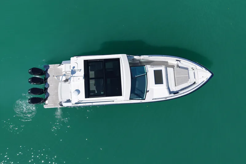 Slide: The Image of 2024 Formula 430 SSC boat on turquoise water, aerial view. - 7