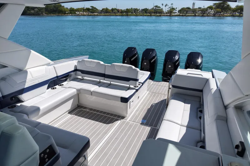 Slide: The Image of 2024 Formula 430 SSC luxury boat with spacious seating and powerful outboard engines. - 8