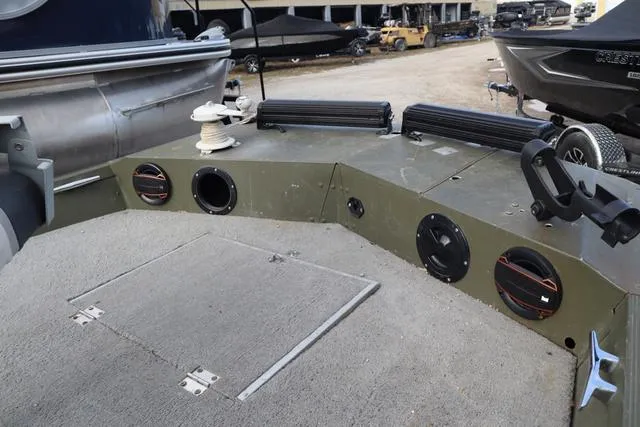 Slide: The Image of 1984 Monark 1648 SC boat interior with speakers and storage compartments. - 13